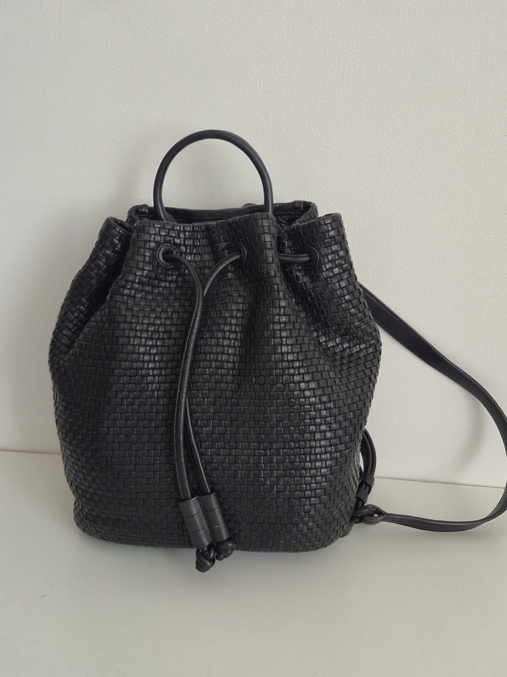 Cole Haan Black Woven Leather Bucket DrawstringBackpack Minimalist Dark Academia